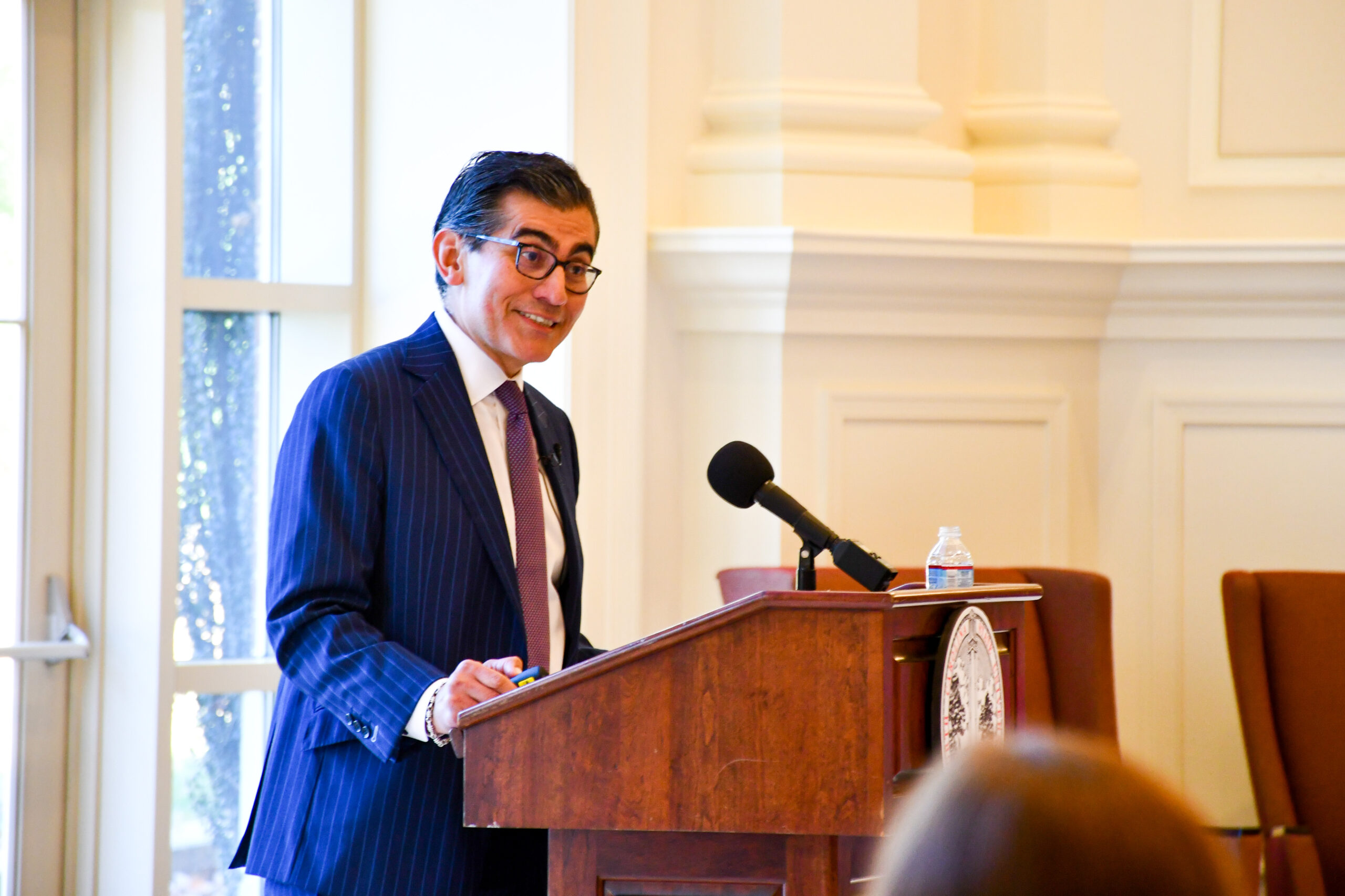 Mike Flores at a podium delivering the 2022 Dallas Herring Lecture