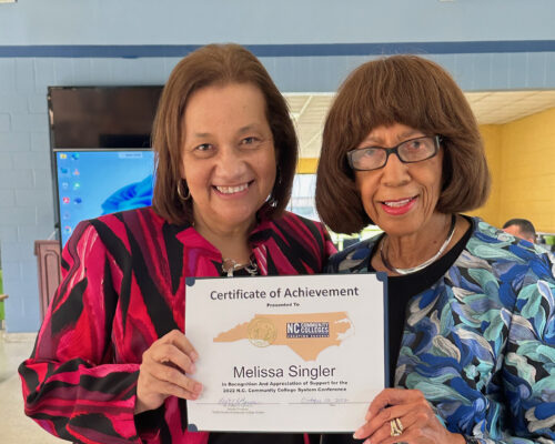 Robeson Community College Board of Trustees Meeting on May 8, 2023, RCC President Melissa Singler was presented with a Certificate of Achievement by Board Chair Shirley Stockton.